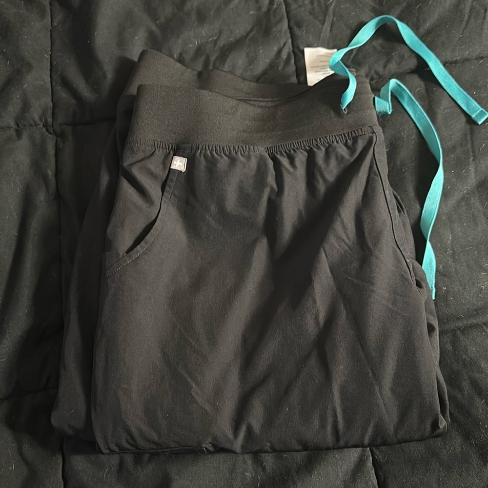 Black windbreaker Figs